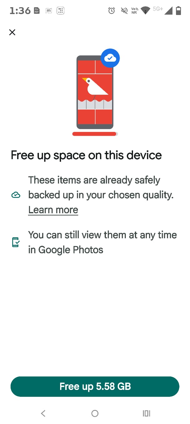 Selecting free up space on this device option in Google Photos