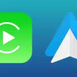 Apple CarPlay and Android Auto logos on a gradient blue background representing smartphone car integration.